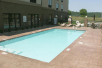 Outdoor pool at Holiday Inn Express & Suites - Cleveland Northwest, an IHG Hotel, TN.
