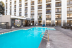 Refreshing outdoor pool with sun loungers.