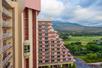 View from a room balcony of other balconies and the mountains at Ka'anapali Beach Club in Maui, Hawaii.