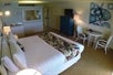 1 Double bed, dining table at Kaanapali Ocean Inn, HI.