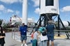 People looking at some of the rockets at the Kennedy Space Center Small Group VIP Experience with Transportation from Orlando Area. Orlando, Florida