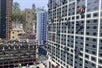 A colorful LEGO cityscape featuring buildings adorned with various colorful LEGO spiders and minifigures at Legoland California.