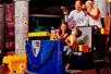 A family on a ride shooting toy guns at LEGOLAND® Discovery Center in Columbus, Ohio.
