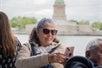 Tourists taking a selfie with the Statue of Liberty