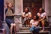 Audrey talking with Crystal, Ronette, and Chiffon on a stoop in Little Shop of Horrors in New York City, New York.