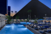 Seasonal outdoor pool with sun loungers at Luxor Hotel and Casino.