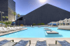 Seasonal outdoor pool with sun loungers.