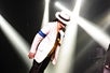 Michael Knight performs on stage as MJ, doing the MJ's signature Anti-Gravity Lean at Reza Live Theatre in Branson, Missouri.