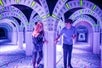 Two teens make their way through the Odyssey mirror maze at MagiQuest.