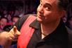 A guy pointing at the camera with a crowd behind him at Magic Show Starring Michael Bairefoot in Myrtle Beach, South Carolina, USA.