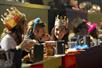 A group of girls smile as they enjoy the feast at Medieval Times
