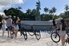 Group of renter stopping at Hand Sculpture at Holocaust Memorial in Miami Beach, Florida
