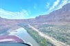 The airplane following the river through the Canyons on the Moab's Best Arches National Park Airplane Tour in Moab Utah, USA.