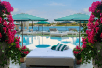 Outdoor pool with cabanas at Mondrian South Beach, FL.