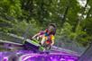 A girl in tie-dye rides the Moonshine Mountain Coaster in Gatlinburg, TN