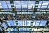 A man in a room of all glass windows and mirrors in SUMMIT One Vanderbilt on the Must-See Manhattan Tour with SUMMIT One Vanderbilt Ticket in New York City, New York, USA.