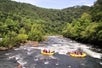 Aerial view of river rafting groups going downstream on the Ocoee River with Quest Expeditions.
