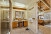 Kitchen includes dishwasher, stove top/oven, microwave, refrigerator, blender, coffeemaker, cookware and tableware at Outrigger Kanaloa at Kona, Kailua-Kona, HI.