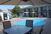Outdoor pool and hot tub at Ozark Valley Inn in Branson, Missouri.