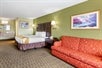 Sitting Area with Sofa Bed at Quality Inn & Suites Buena Park Anaheim, LA.