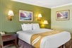 Bedroom 1 - 1 Queen Bed at Quality Inn & Suites Buena Park Anaheim, LA.