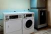 Guest laundry services at Red Roof Inn PLUS+ San Antonio Downtown, Riverwalk.