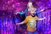Two young children in the bright purple Vortex Tunnel at Ripley's Believe It or Not! Ocean City.