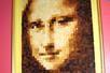 A portrait of Mona Lisa made entirely out of different shades of toast on display at Ripley's Believe It or Not! Orlando Odditorium.