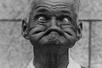 Close up of an old photo of a man making a funny face on display at Ripley's Believe It or Not! Orlando Odditorium.