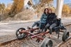 Two women posing for a picture on a railbike in West Sacramento, California.