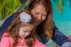 SeaQuest Aquarium Mom and Daughter Feed Stingray