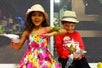 Kids feeding Budgie parakeets at SeaQuest