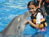 Dolphin Encounter --- Popular among families. 1 year old and up can participate. Play and kiss with dolphins.