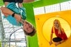 Children playing at the trampoline park.