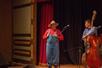 The cast of bluegrass performers on stage playing music at Shepherd of the Hills in Branson, Missouri.