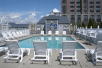 Seasonal outdoor pool at Shoreline Inn & Conference Center, Ascend Hotel Collection, MI.
