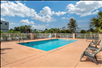 Refreshing seasonal outdoor pool with pool lift.