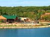View of the pavilion and pool from across Fox Hollow Lake - StoneBridge Resort in Branson West, Missouri