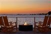 Relax and watch the sunset in the patio with a firepit and rocking chairs..