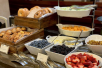 Enjoy breakfast with freshly baked pastries, fruits and more.