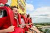 People riding the Power Tower and laughing at Valleyfair in Bloomington, Minnesota.