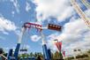 View looking up at the Xtreme Swing in motion on a sunny day at Valleyfair in Bloomington, Minnesota.