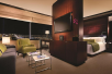 Seating area, sofa bed, flat-screen TV at Vdara Hotel & Spa at ARIA Las Vegas, NV.