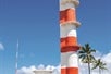 A close up look at the tall Aviation Museum Tower with the blue sky on it's background in Ford Island Control Tower, Hawaii.