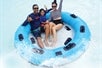 Family riding raft on the Ohana Highway at Wet'n'Wild Hawaii.
