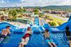 A family lined up at the top of a water slide ready to go down at White Water in Branson, Missouri.