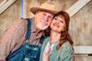 An older man and woman in country style clothes at WhoDunnit Hoedown Murder Mystery Dinner Show in Branson, Missouri.