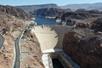 Aerial view looking down on the Hoover Dam on a sunny day.