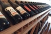 Many wine bottles on a rack at the Otis Kenyon winery in Woodinville, Washington.