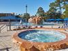 Relax in the poolside hot tub at Wyndham Garden Lake Buena Vista Disney Springs Resort Area in Lake Buena Vista, Florida.